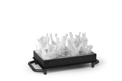 Form 3L build platform with print on it. Shop additive manufacturing printers, resins and accessories | eacadditive.com.